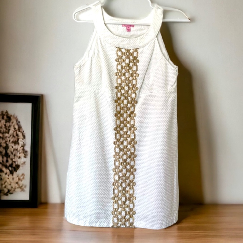 Lilly Pulitzer Dress Size 12 White with shimmering Gold trim. Beautiful dress!